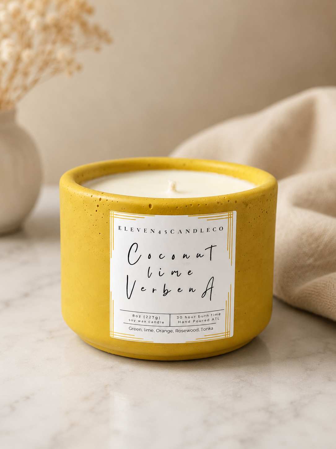Coconut Lime Verbena concrete candle by Eleven45 Candle Co. in a handmade refillable vessel